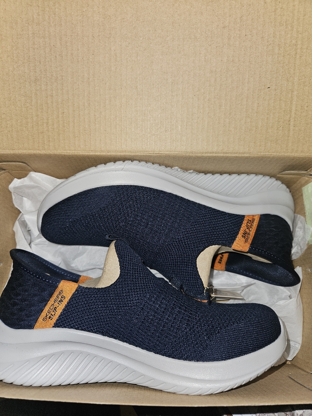 Skechers Kids Navy Slip-On Sneakers with Orange Accents